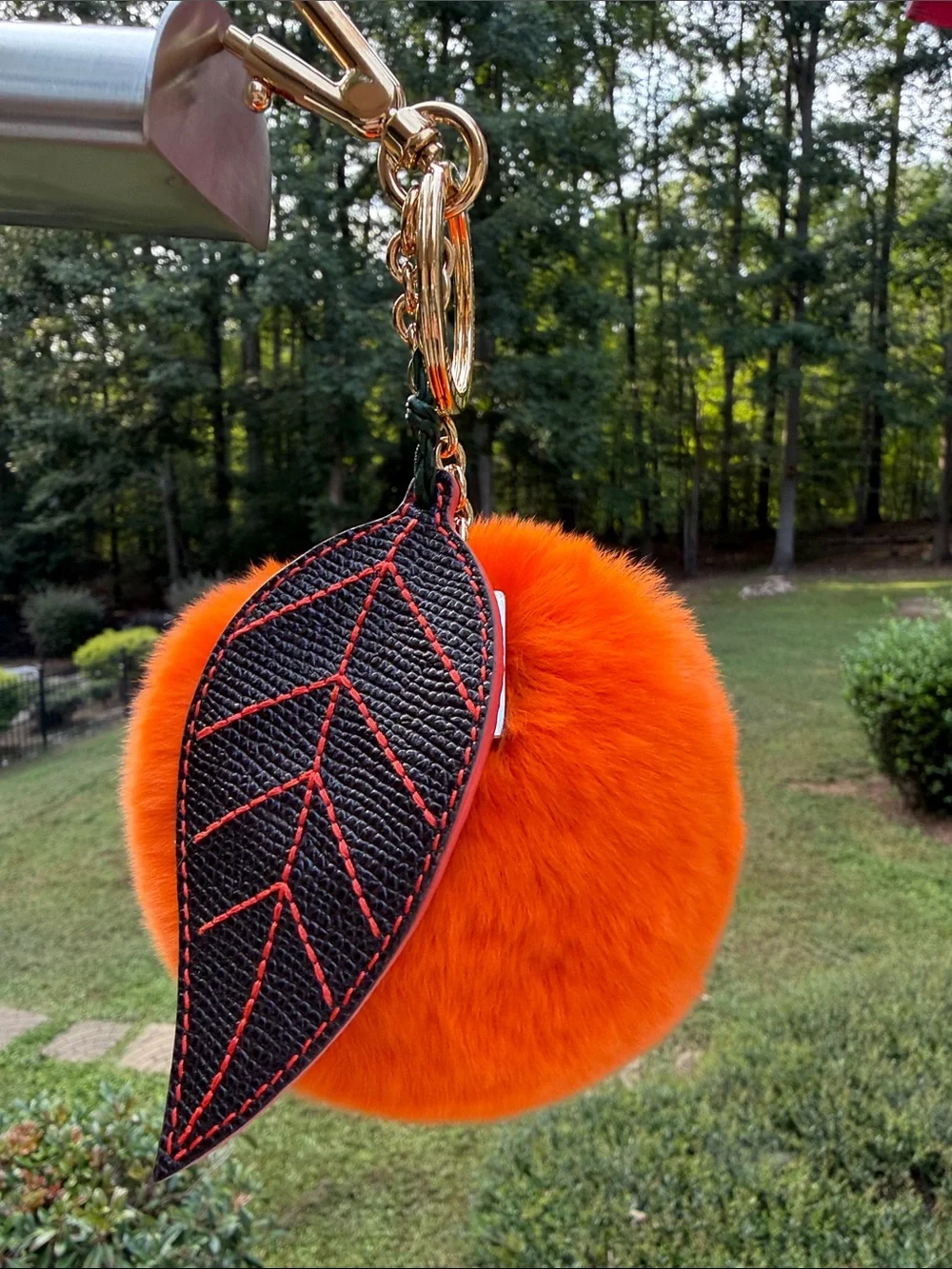 Dolce & Gabbana Orange  Mink Fur Pom-Pom Keychain with Black Leaf Accent